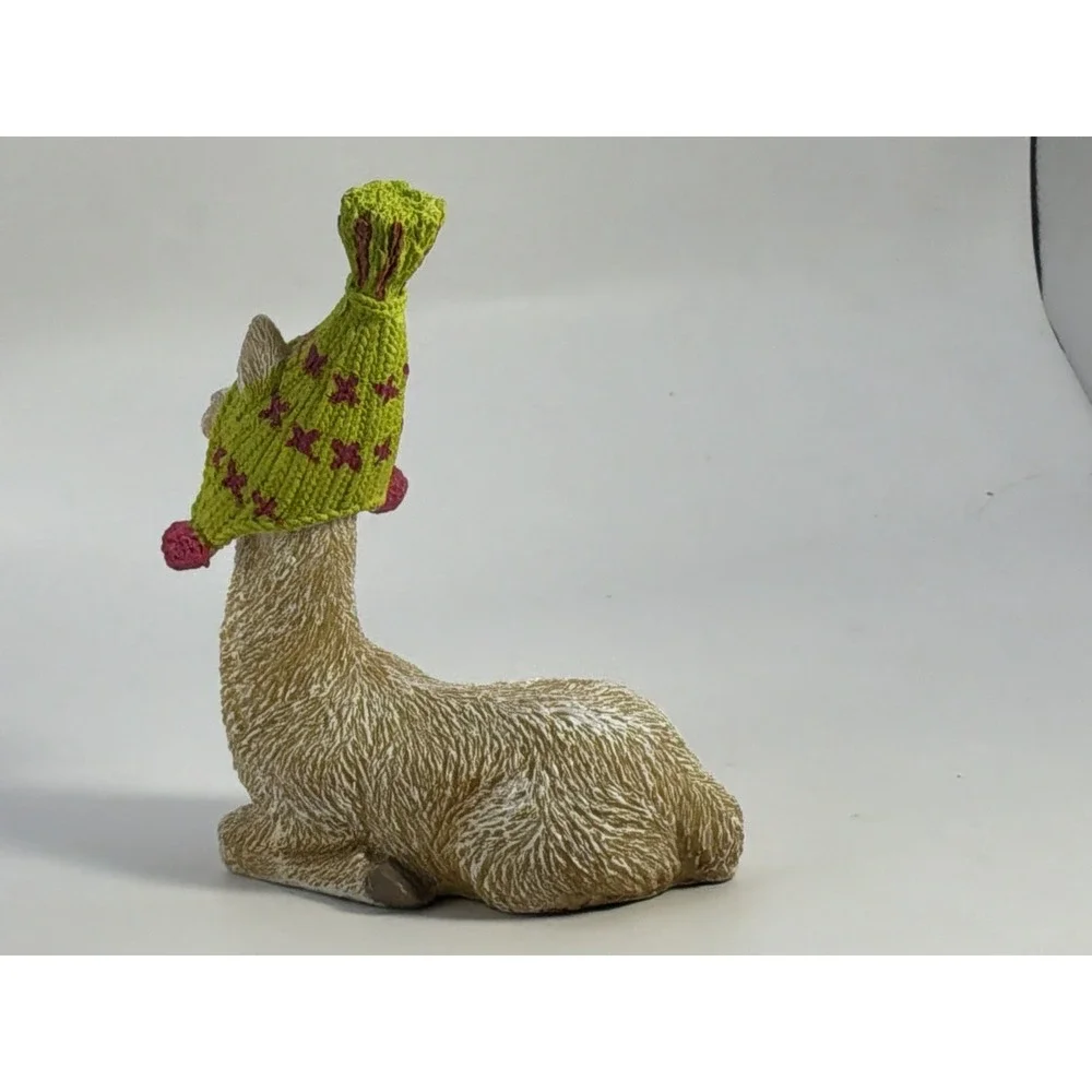 Cute Llama Wearing A Bright Green Stocking Cap Hat